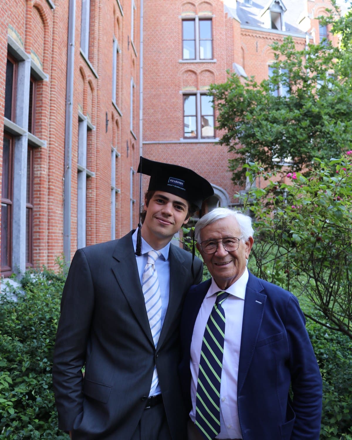 Hugo Alonso, on the left, with an older man in a navy blazer